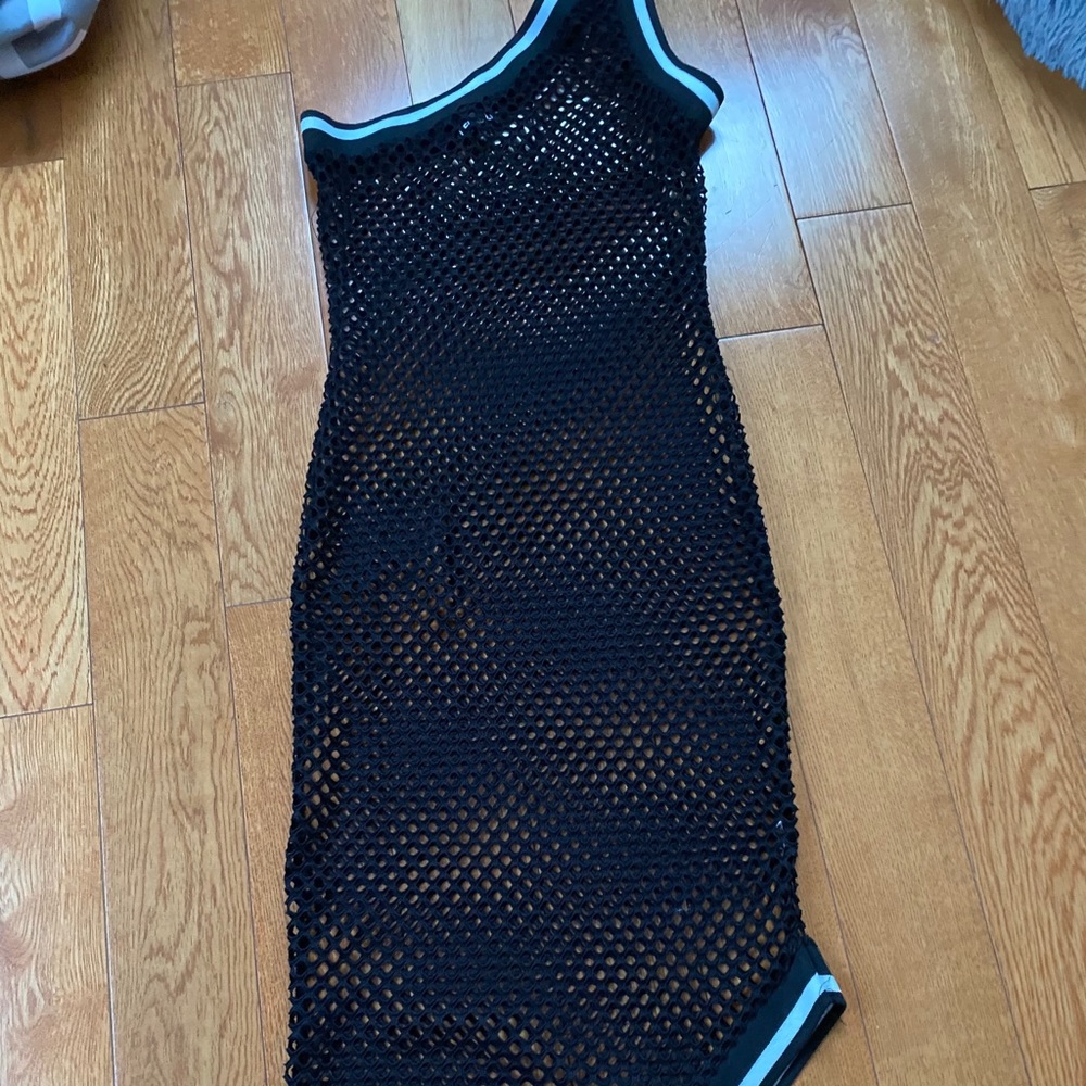 Black fishnet asymmetrical dress , size Small.